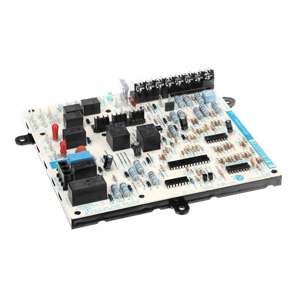 A rectangular electronic circuit board with various components including capacitors, resistors, relays, and connectors mounted on its surface.