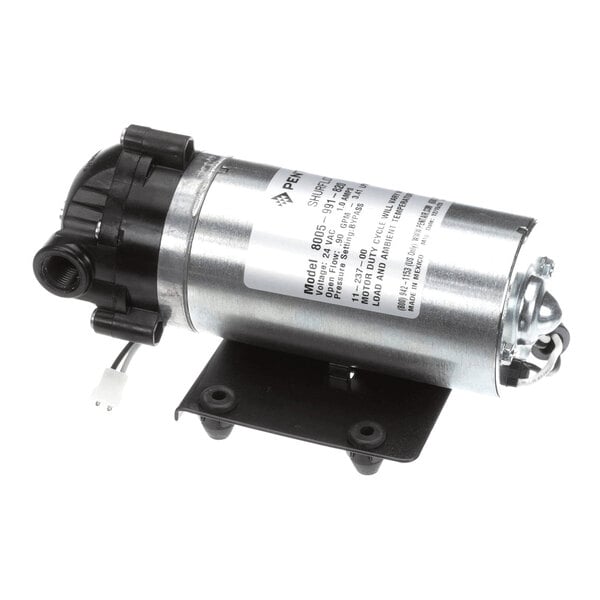 A cylindrical metallic pump with a black mounting bracket, electrical wiring, and a label with specifications attached to its side.