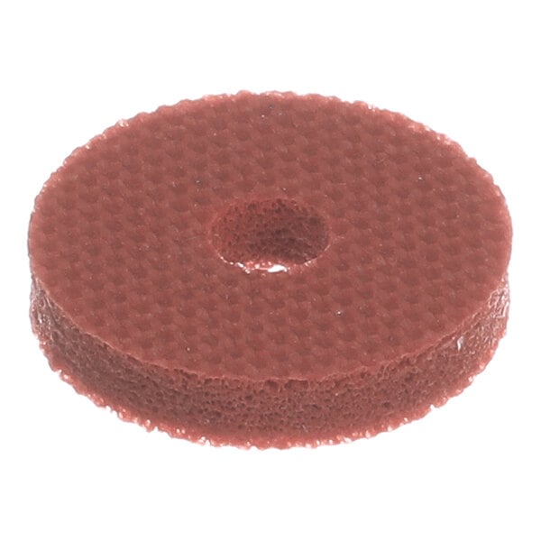 A round, textured, reddish-brown gasket or seal with a central hole.