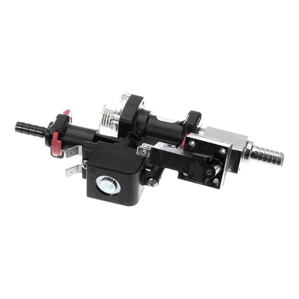 A mechanical assembly with various metal and plastic components, including connectors, a solenoid, and fittings, arranged in a compact configuration.