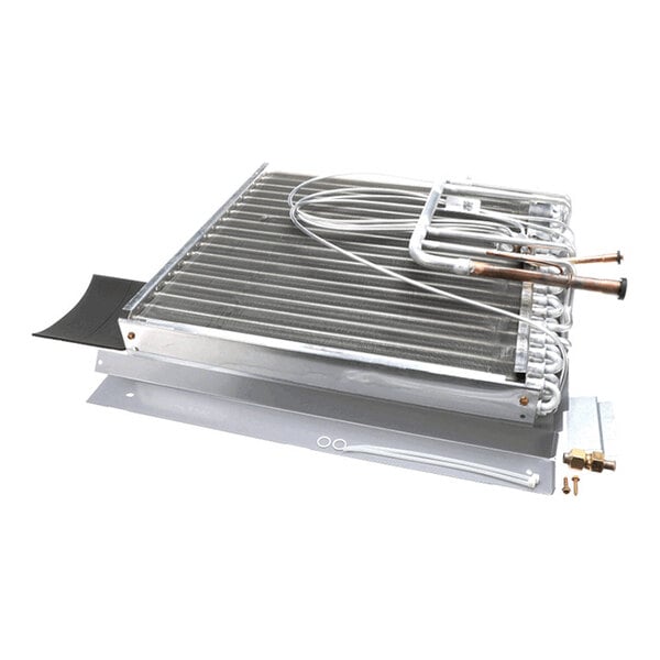 A metal coil assembly with multiple tubes and fins, accompanied by a few small fittings and accessories, displayed on a white background.