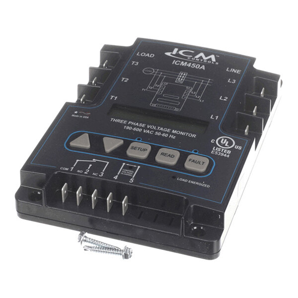 A black electronic device labeled 'ICM450A' with multiple connection terminals, buttons, and two screws placed in front of it.