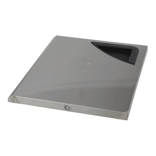 A square metallic panel with a black handle in the upper right corner, likely a door or cover.