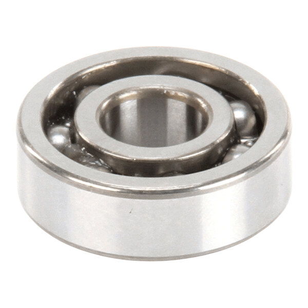 A metallic circular ball bearing with visible ball bearings inside an outer and inner ring.