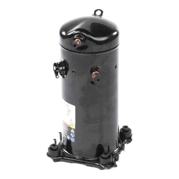 A black cylindrical metal component with copper pipe fittings and a mounting base, likely part of a mechanical or HVAC system.