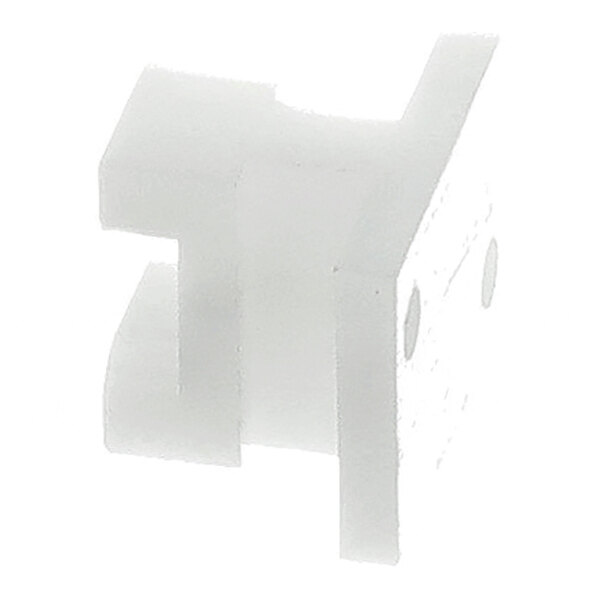 A white, block-shaped plastic component with a notched design and two visible holes on one side.