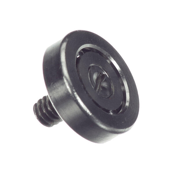 A black, round metal component with a central screw and a grooved outer edge, likely a roller or bearing part.