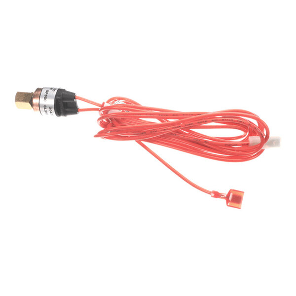 A cylindrical metal and plastic switch component attached to a long red wire with a connector at the end.