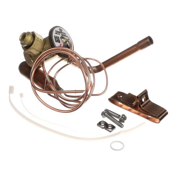 A metal valve assembly with coiled copper tubing, a mounting bracket, screws, and a washer, all laid out on a white background.