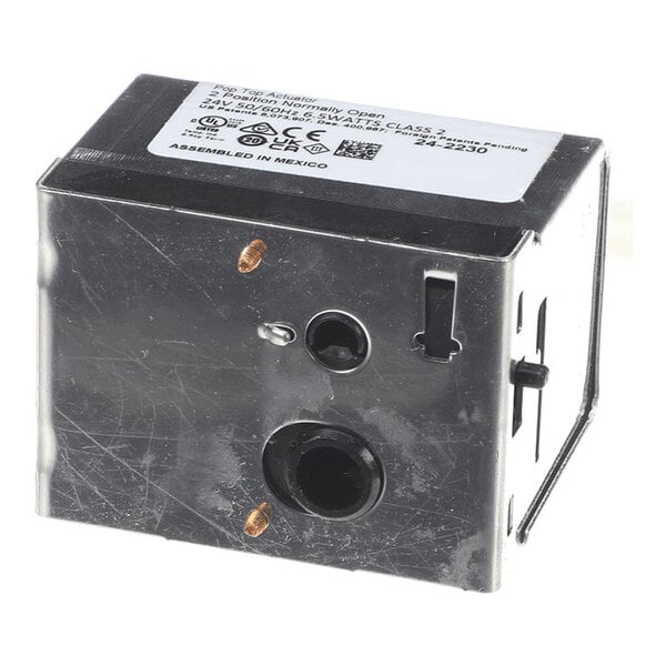 A rectangular metallic and plastic electrical actuator box with a label on top, visible mounting holes, and a protruding lever on the side.