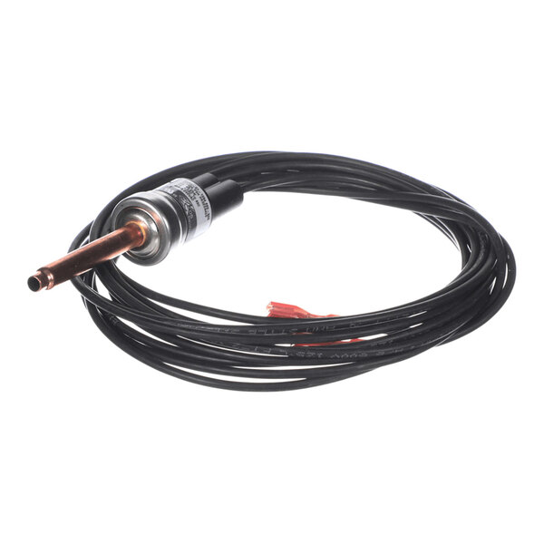 A coiled black cable attached to a cylindrical metal component with a copper tube extending from one end.