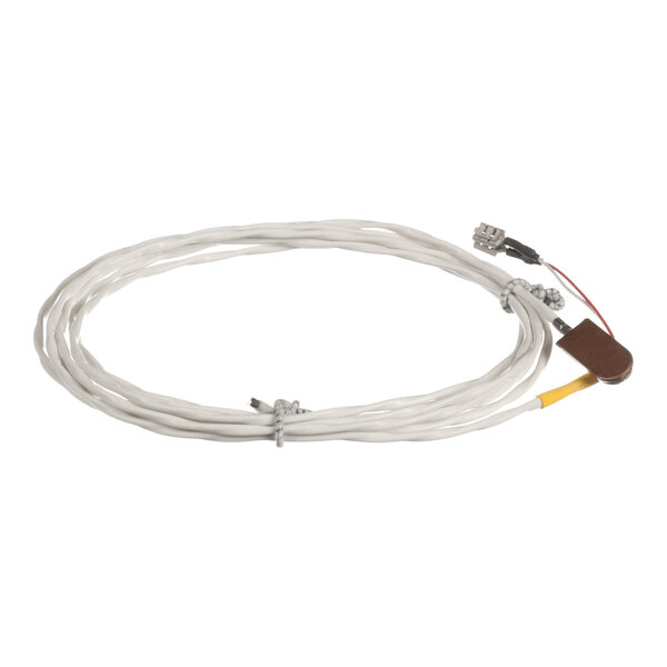 A coiled white cable with connectors and a small brown sensor attached at one end.