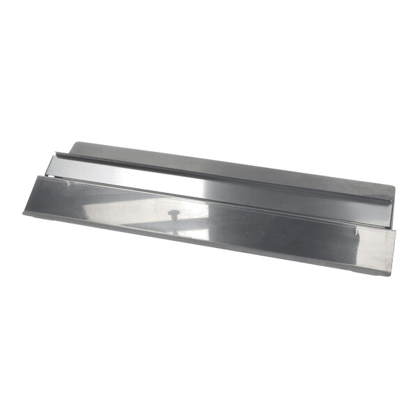 A rectangular, metallic object with angled edges and a reflective surface, likely designed to hold or support tools.