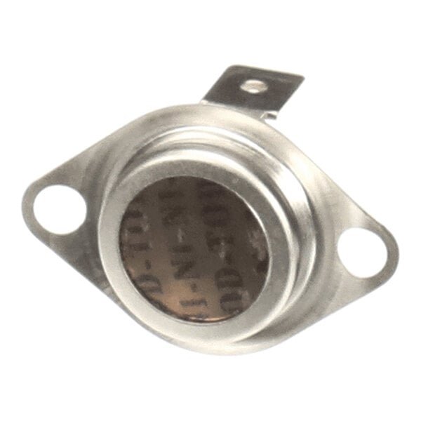 A metallic component with a circular center and two mounting holes on either side, featuring a small tab with a hole for electrical connection.