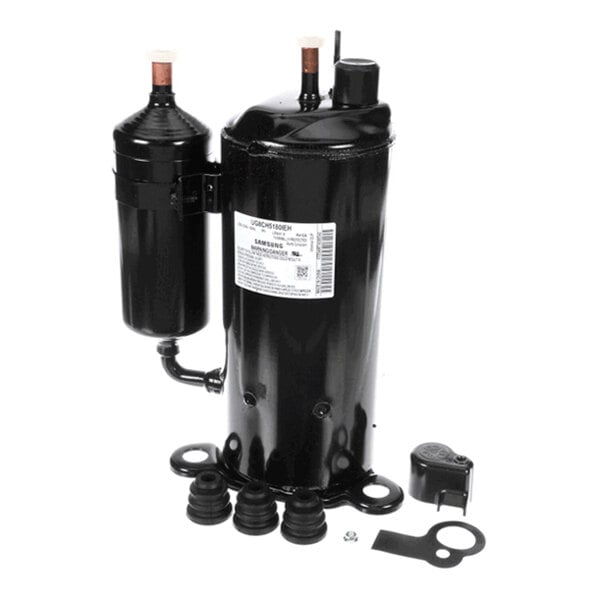 A black cylindrical mechanical component with attached parts and accessories, featuring a label with text and barcodes.