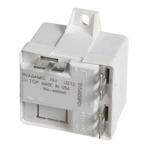 A white electrical relay with metal terminals and printed specifications on its surface.