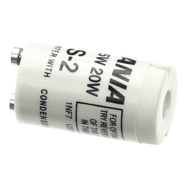 A cylindrical white electrical component with two metal prongs and printed black text.