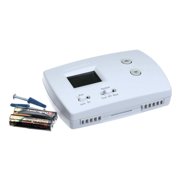 A white digital thermostat with a small display screen, two buttons, two switches, two AA batteries, and two mounting screws with anchors.