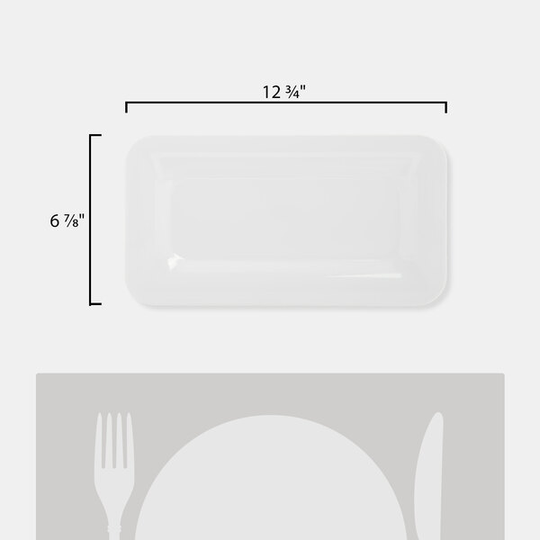 A rectangular white Carlisle display food pan with a white background.