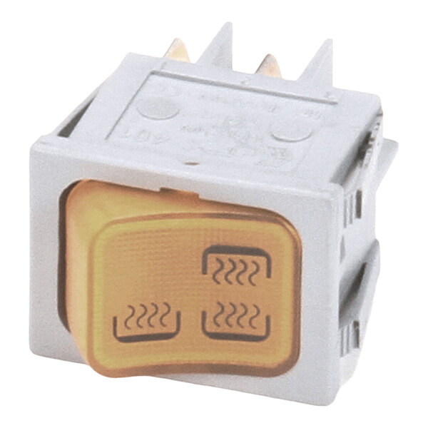 A square, gray and yellow illuminated switch with a wavy line symbol on the front, likely indicating a heating function.