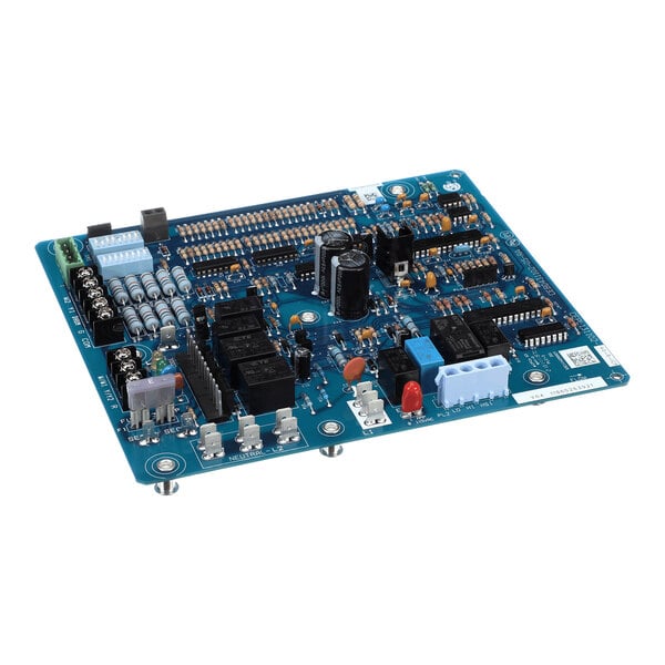 A blue electronic circuit board with various components including capacitors, relays, connectors, and integrated circuits mounted on it.