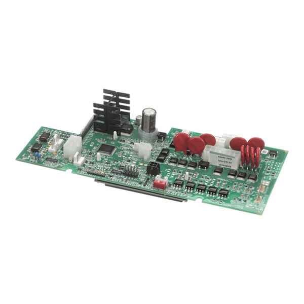 A green printed circuit board with various electronic components, including capacitors, resistors, heat sinks, and connectors.