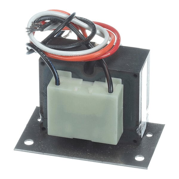 A metal-cased electrical transformer with a plastic terminal block and several colored wires attached, mounted on a flat metal base with four holes.