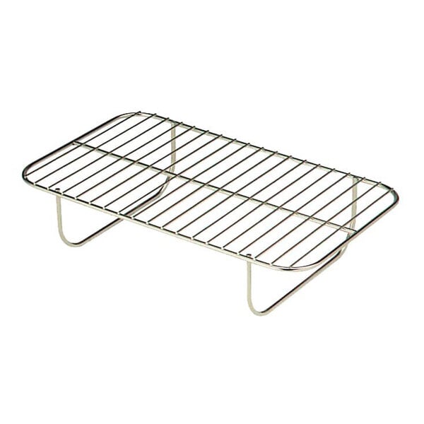 A rectangular metal wire rack with four short legs, designed for supporting items above a surface.