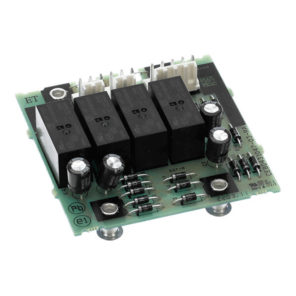 A green electronic circuit board with multiple black relays, capacitors, resistors, and white connector terminals mounted on it.