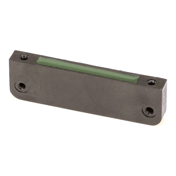 A rectangular black block with four screw holes and a green strip along the top surface.