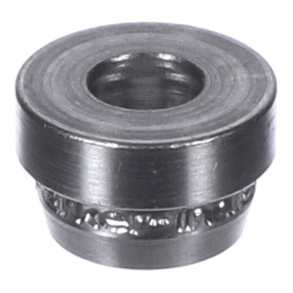 A metal cylindrical component with a central hole and a visible ring of ball bearings around its lower section.