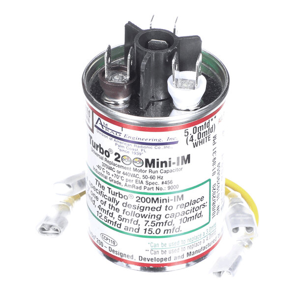 A cylindrical electrical capacitor with multiple terminals and attached wires, labeled with technical specifications and replacement information.