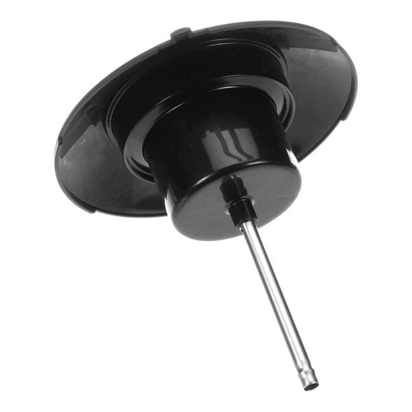 A black plastic lid assembly with a central cylindrical section and a protruding metal tube.
