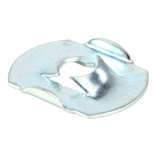 A round, metallic component with a central cutout and raised, curved tabs, likely used for mounting or securing purposes.