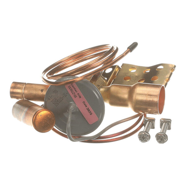 A set of copper and metal components, including coiled tubing, a cylindrical valve, a mounting bracket, and two screws, arranged on a white background.