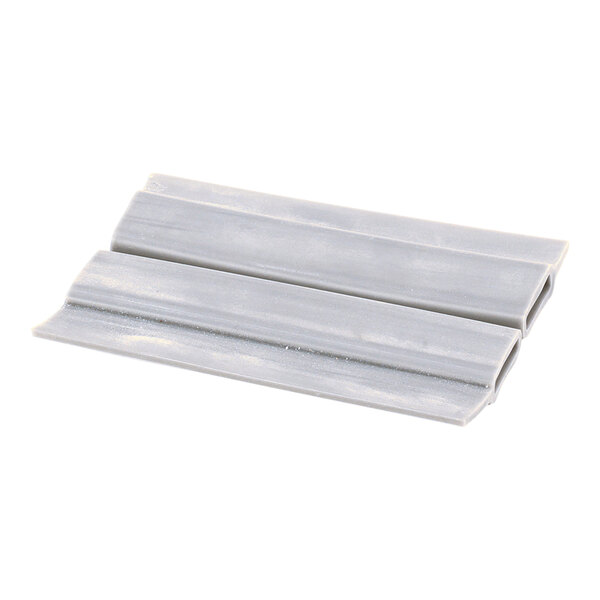 A pair of gray, rectangular plastic scraper blades with a slightly curved profile, shown lying flat on a white background.