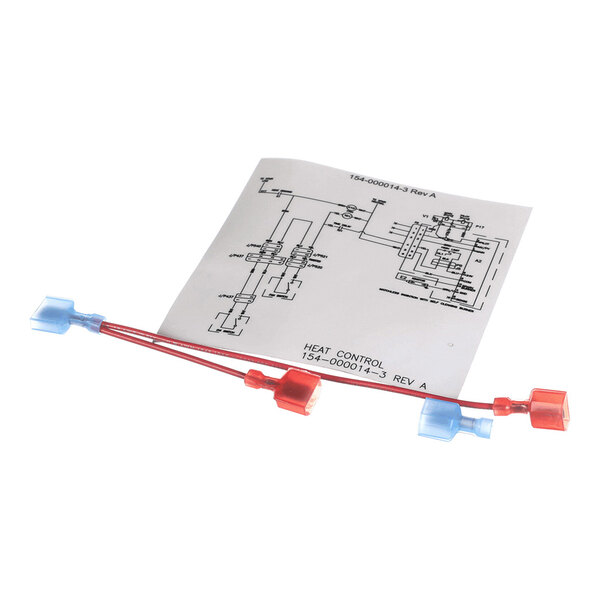 A pair of red and blue electrical jumper wires with connectors, placed on top of a printed wiring diagram labeled 'HEAT CONTROL.'