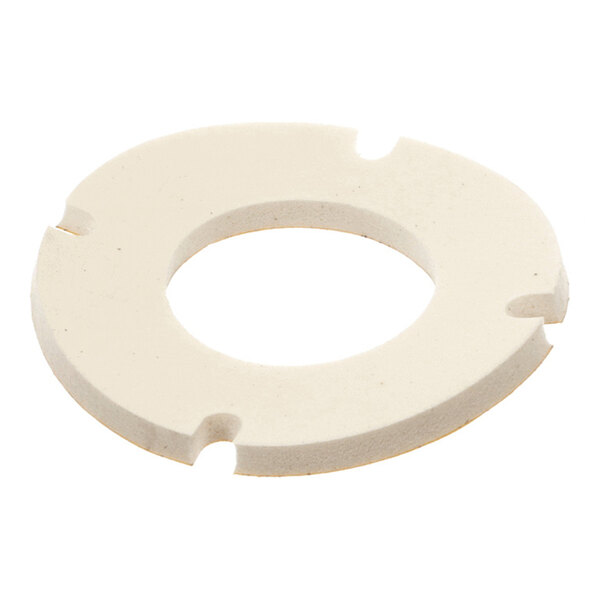 A round, flat, off-white gasket with a central hole and four evenly spaced notches along the outer edge.