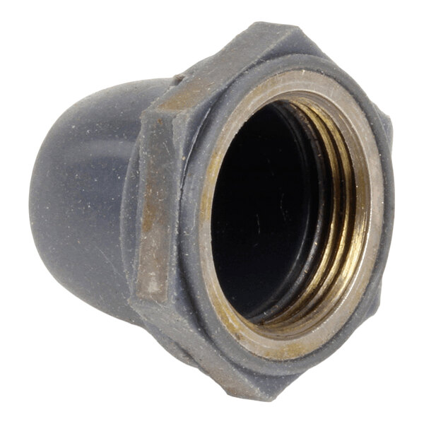 A close-up view of a gray, hexagonal, threaded cap or boot with a metallic inner ring.