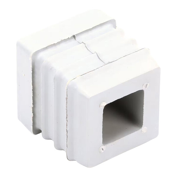 A white, square-shaped rubber or plastic foot with a hollow center and ridged sides.