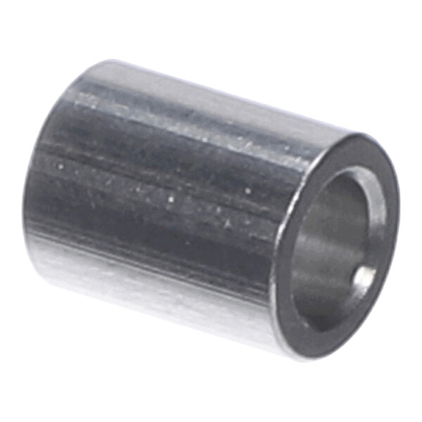 A cylindrical metallic spacer with a hollow center.
