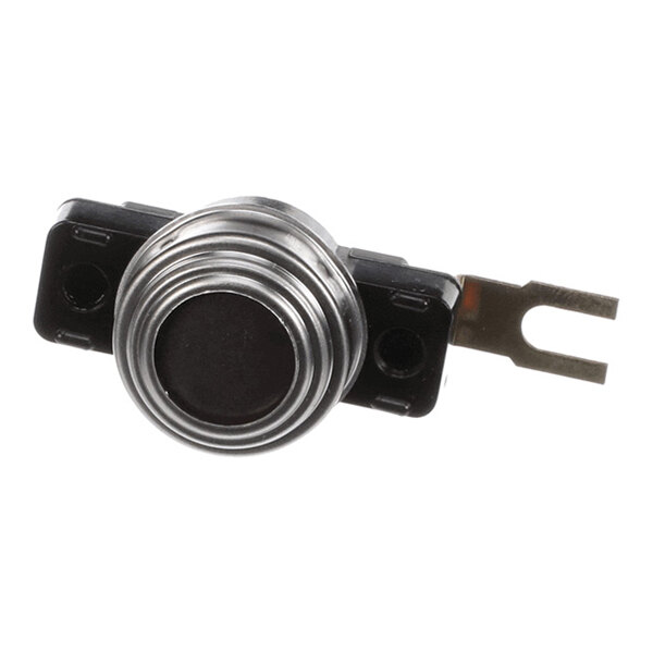 A small, round metallic and black electronic component with a flat metal prong and two mounting holes.