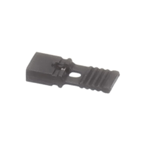 A small, black plastic component with a rectangular shape, a central hole, and ridged texture on one end.