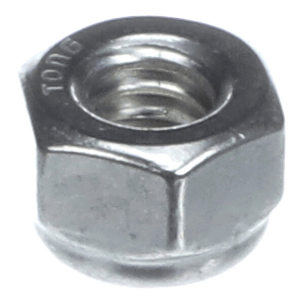 A close-up view of a metallic hexagonal nut with internal threading.