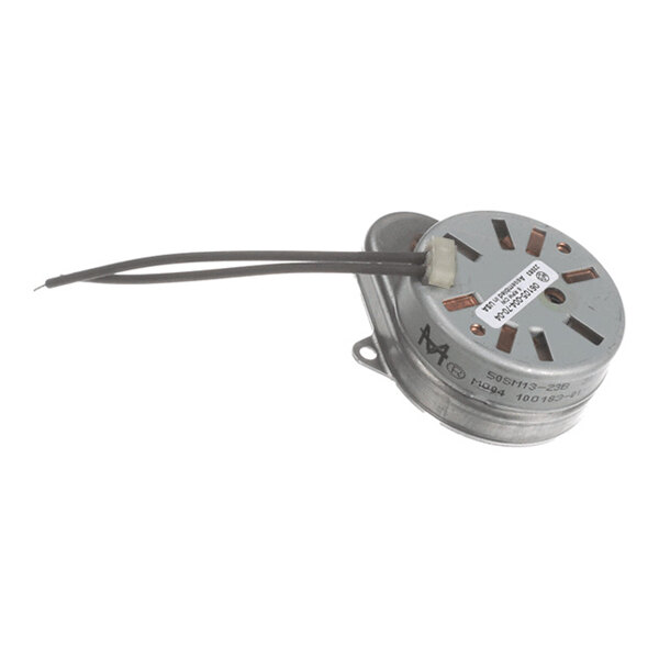 A small round metal motor with two attached wires and ventilation slots on the top.