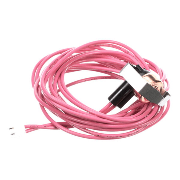 A coiled pink wire with a small black and metallic component attached at one end.