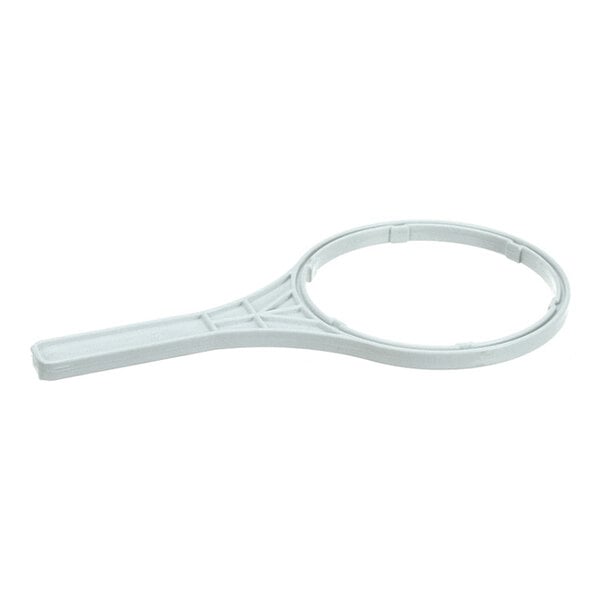 A white plastic spanner wrench with a circular opening and a handle, designed for turning or loosening round objects.