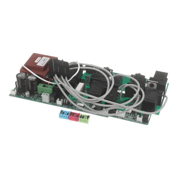 A green electronic control board with various components, capacitors, relays, connectors, and several attached wires.