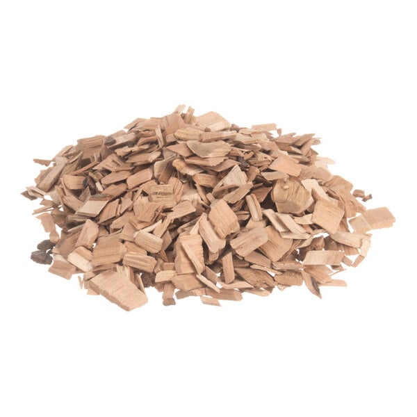 A pile of small, light brown wood chips on a white background.
