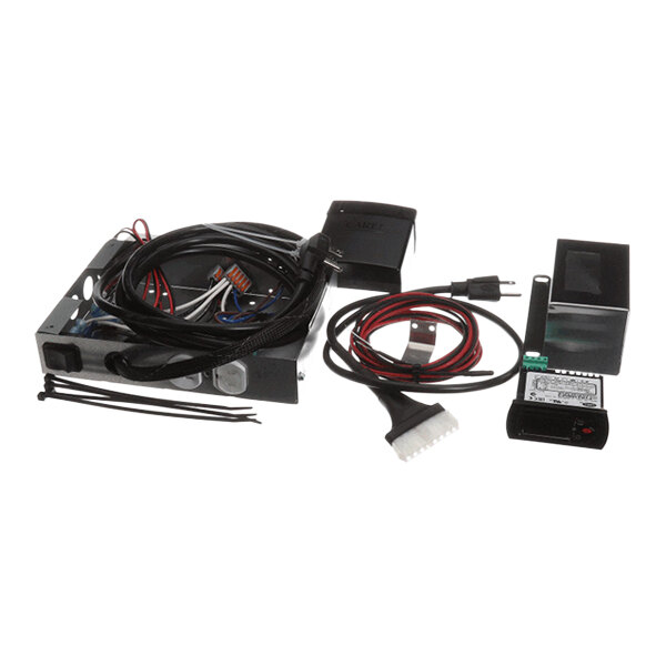A collection of electronic components and wiring, including a metal control box, cables, connectors, and a power cord, arranged on a white background.